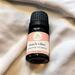 Whole Self Aromatherapy's Beach Vibes Essential Oil Blend on white linen.